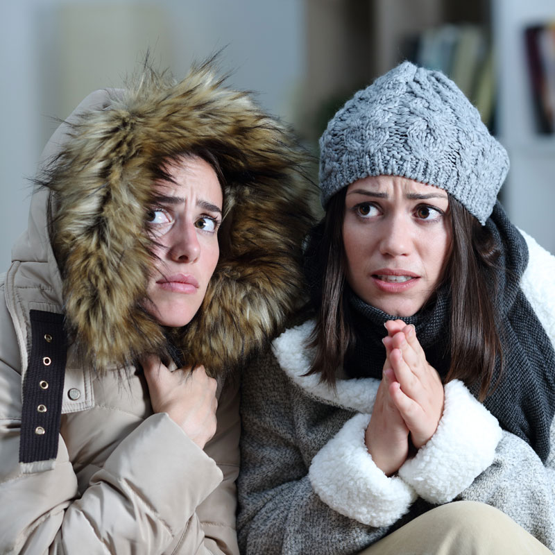 two ladies with parkas